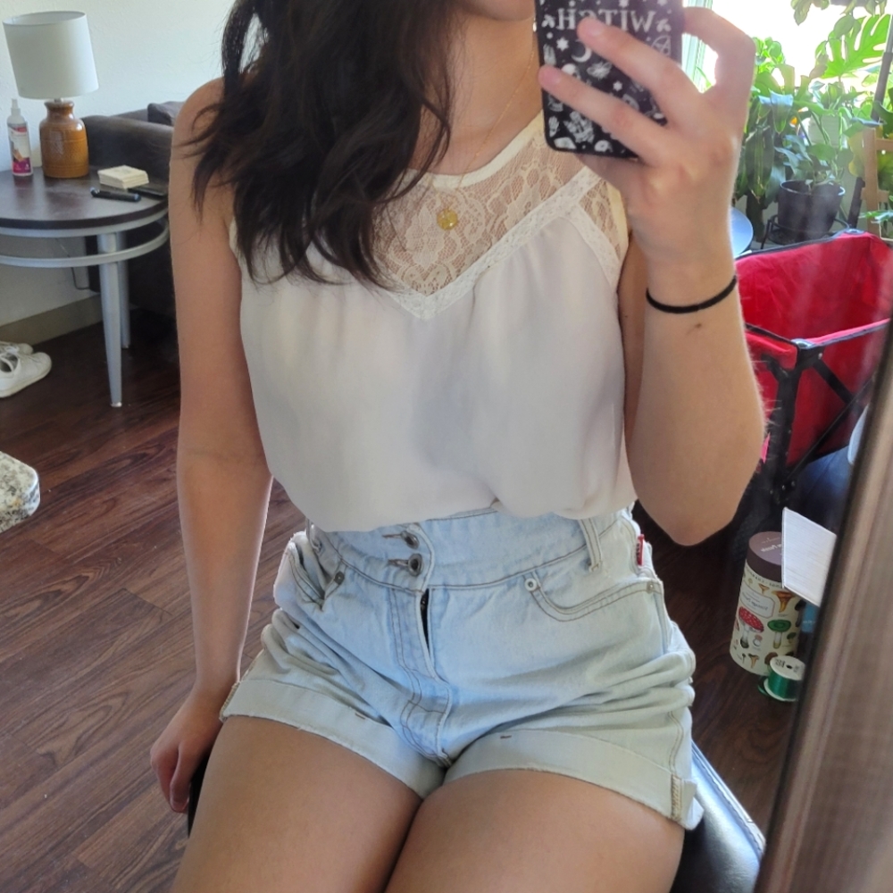 White sleeveless blouse